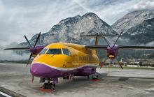 Flugzeug der Welcome Air in gelb und violett lackiert