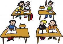 Bild einer Klasse - vier Tische, an denen Kinder sitzen